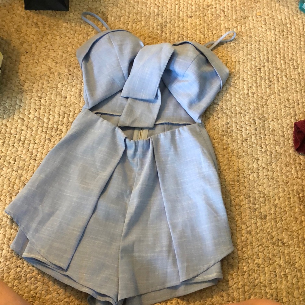 Light blue romper with key detail